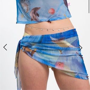 Maison Cléo | Dolphins & Seashells Mesh Beach Wrap